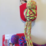 One yellow, red and green Wubba Weaves and one blue, pink and purple Wubba Weaves